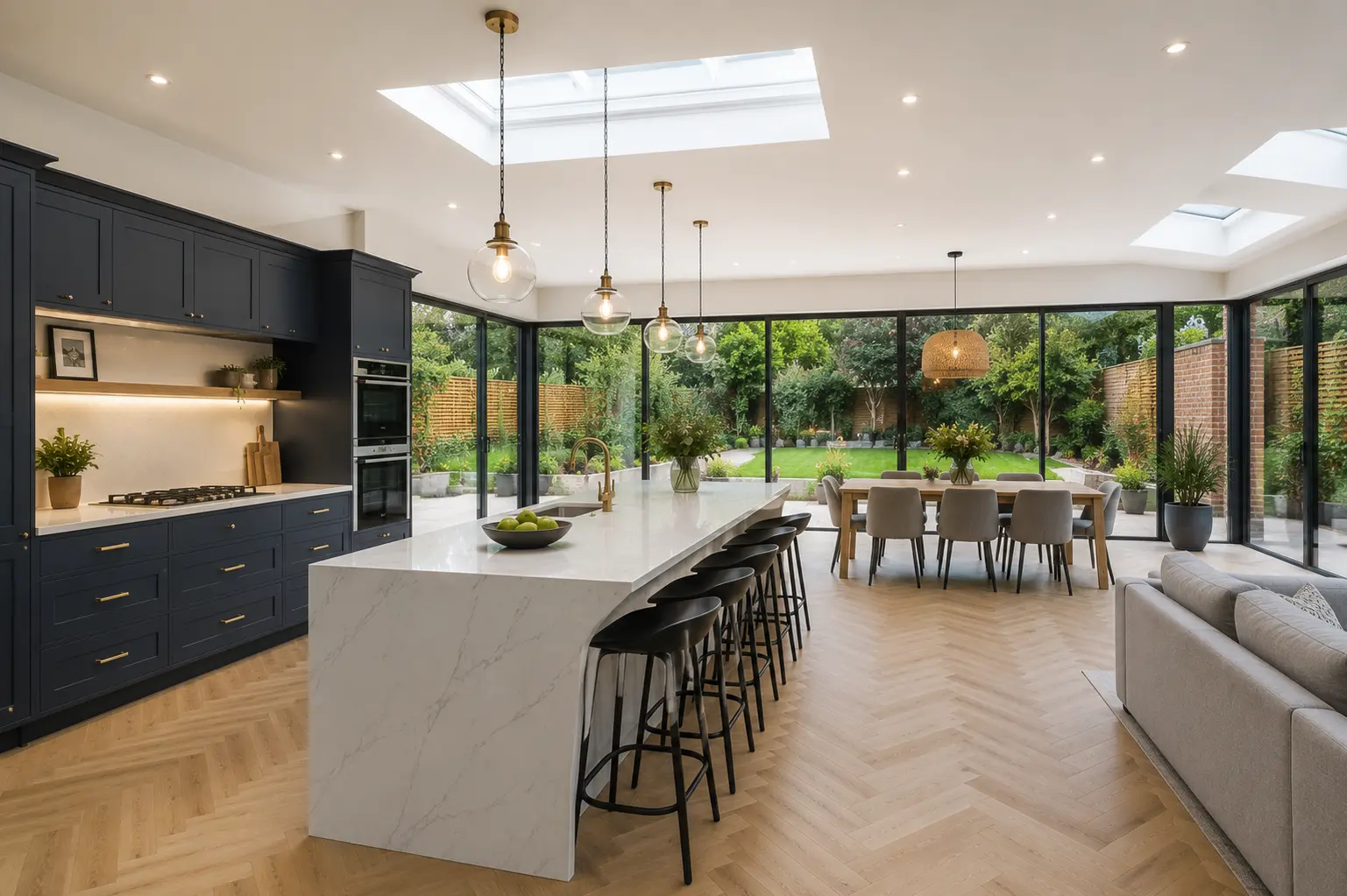 Wraparound kitchen extension in Barnet with quartz island and sliding doors